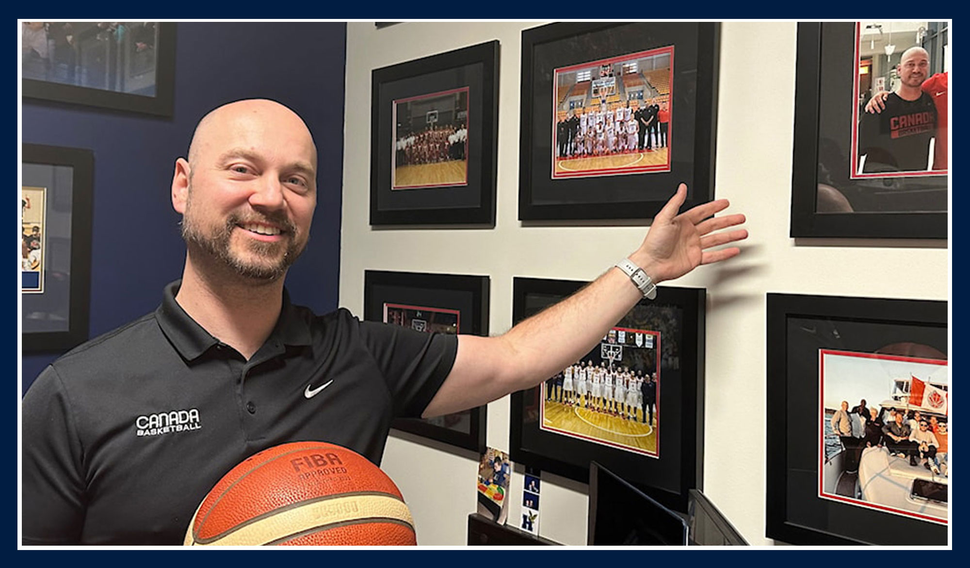 James DePoe showing off his pictures from Canada basketball