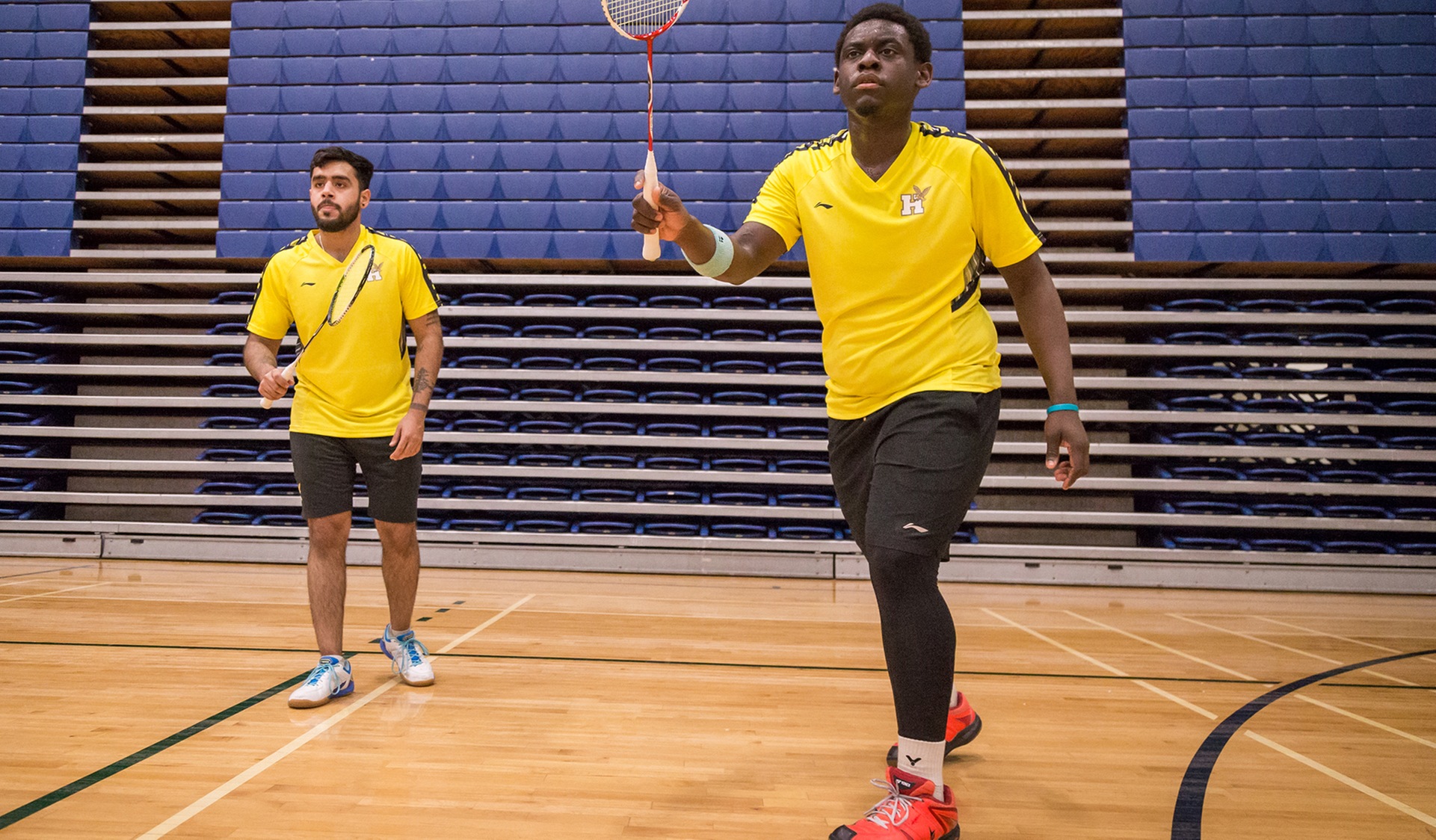 BADMINTON TEAMS PUT THEMSELVES IN POSITION TO ADVANCE TO MEDAL GAMES ON SATURDAY