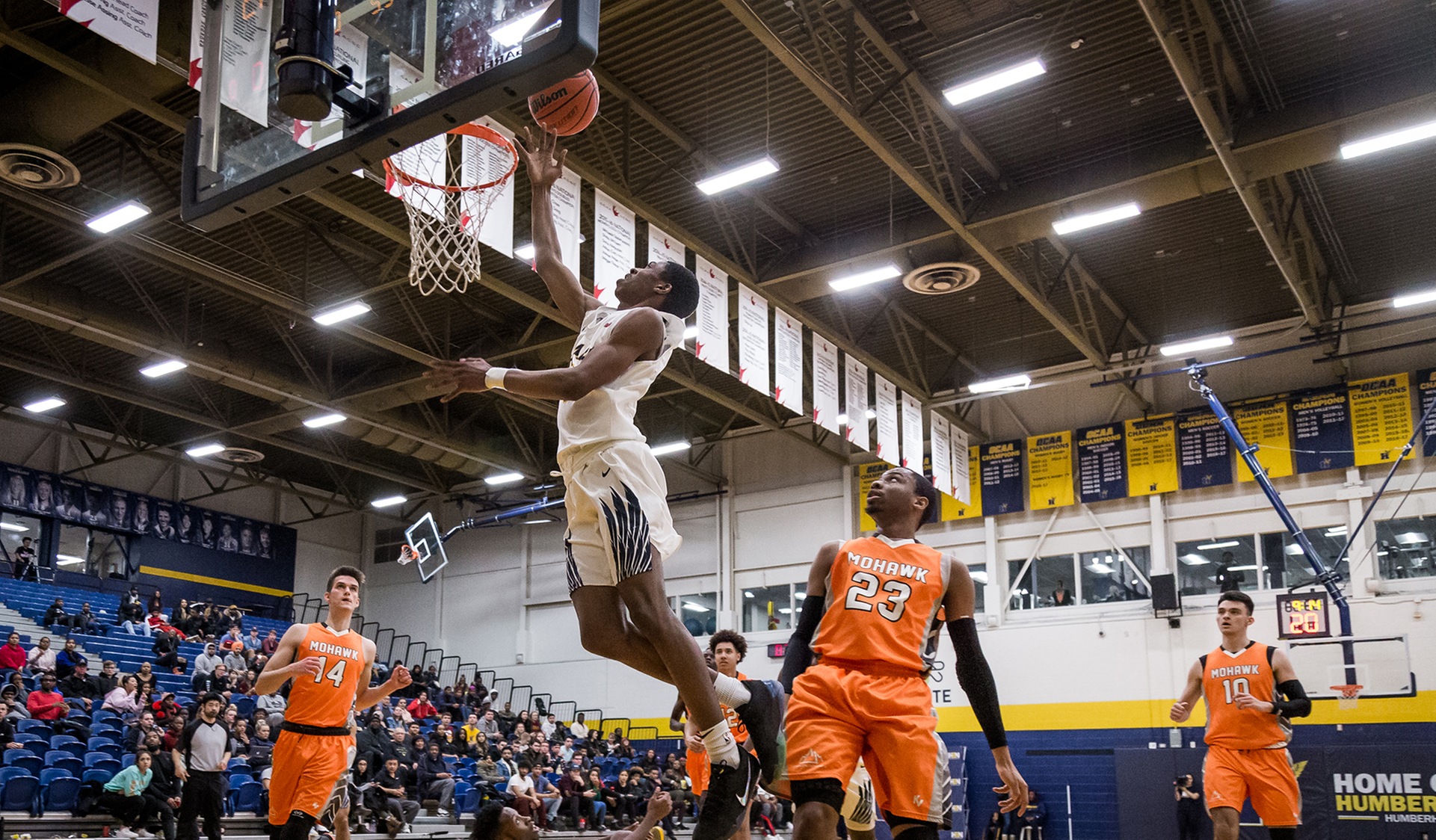 No. 5 MEN'S BASKETBALL RALLY FROM BEHIND TO BEAT MOHAWK, 92-84