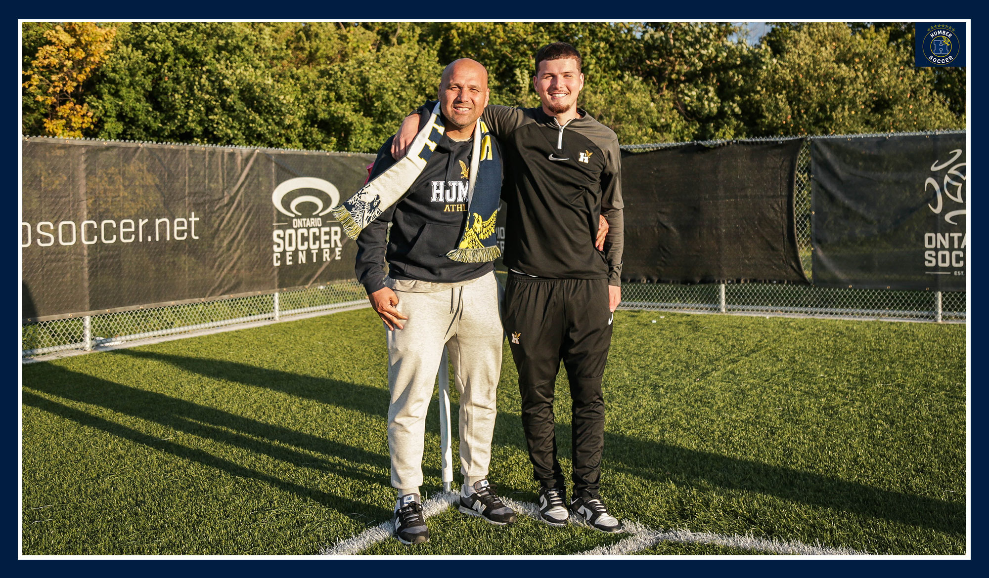 Franz posing for a photo with his father