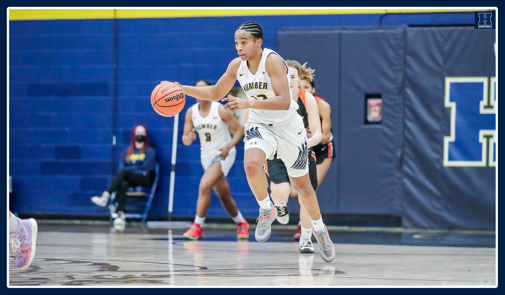 Miea drives up the court