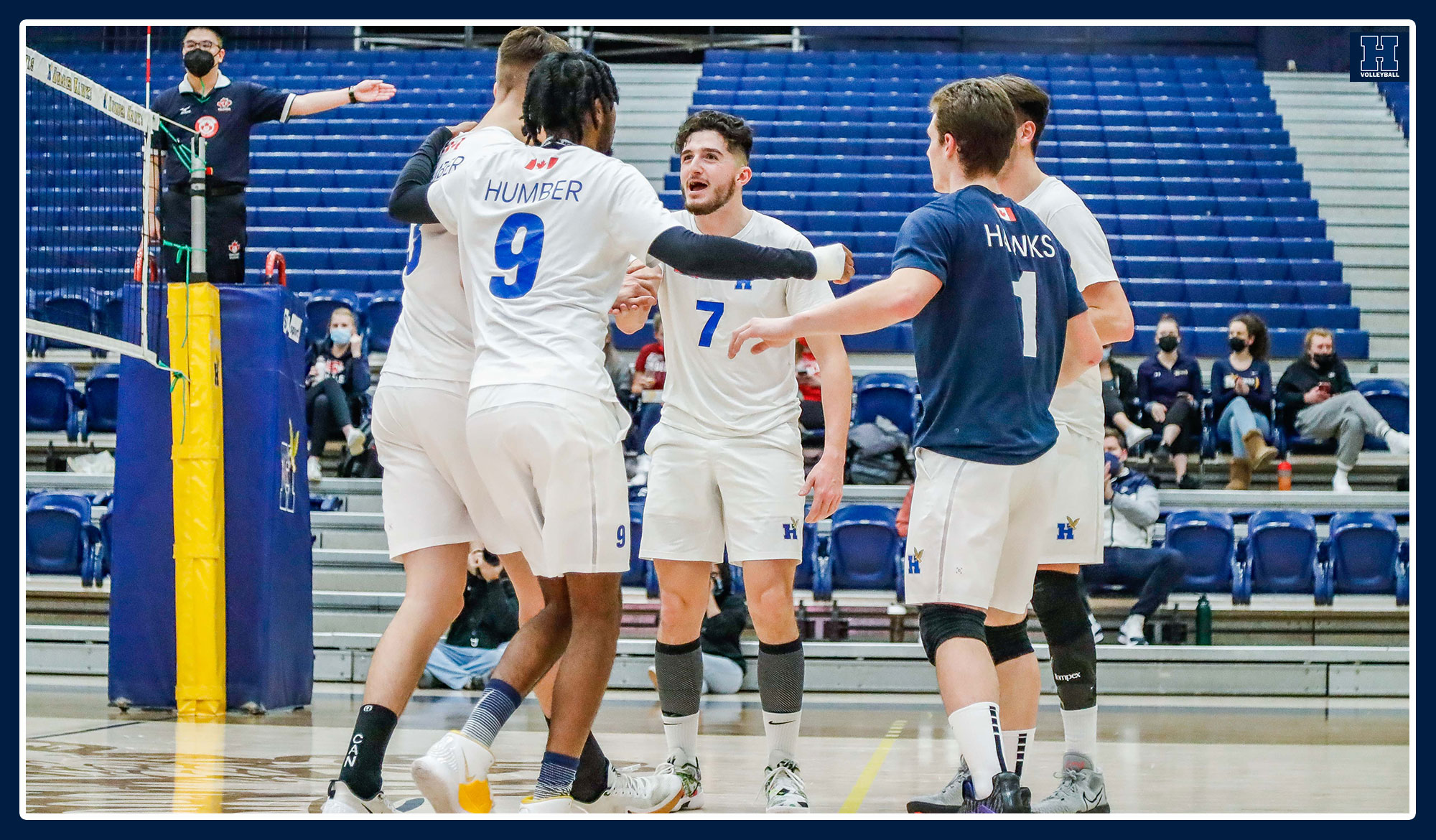 Men's volleyball celebrate a point against Redeemer