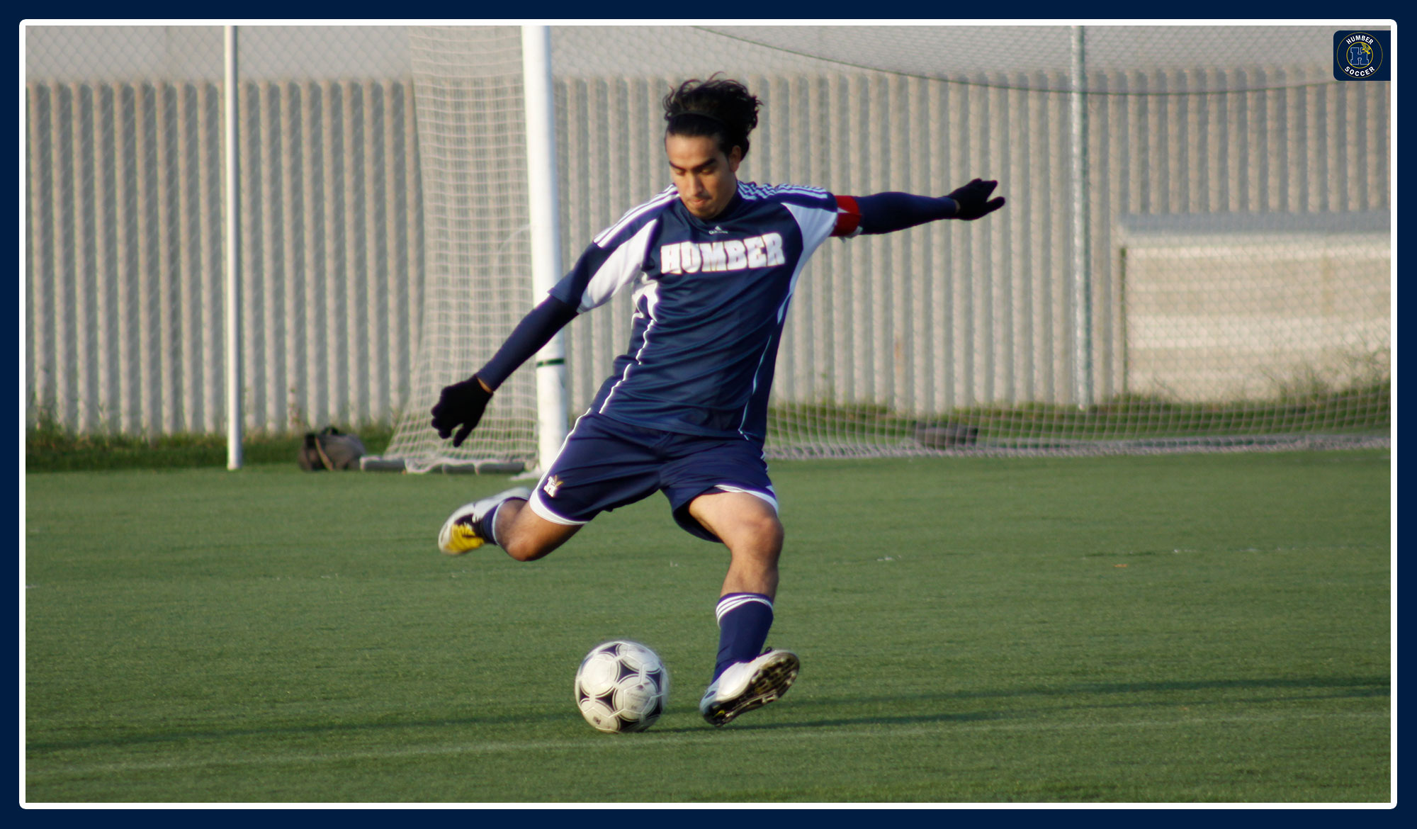 Marcelo kicking the soccer ball in a match for Humber in 2011