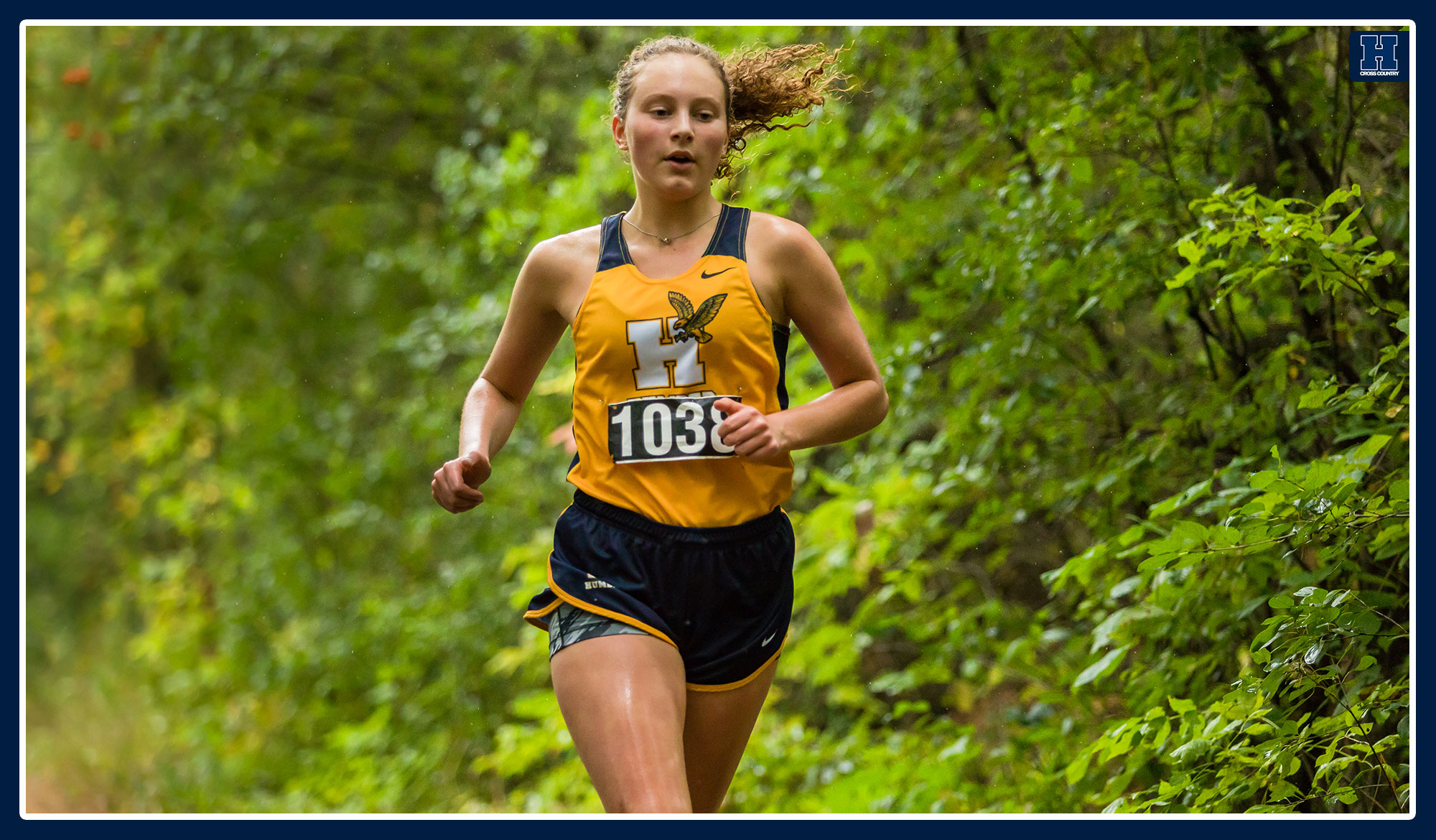 Megan Rasso running through the forest